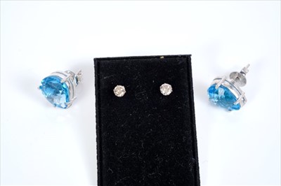 Lot 430 - Pair diamond platinum stud earrings and pair 18ct white gold blue topaz stud earrings