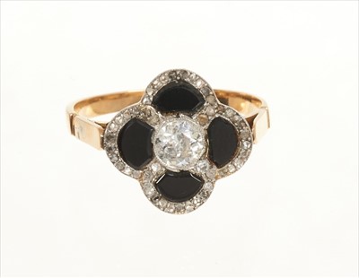 Lot 435 - Art Deco diamond and black onyx quatrefoil ring