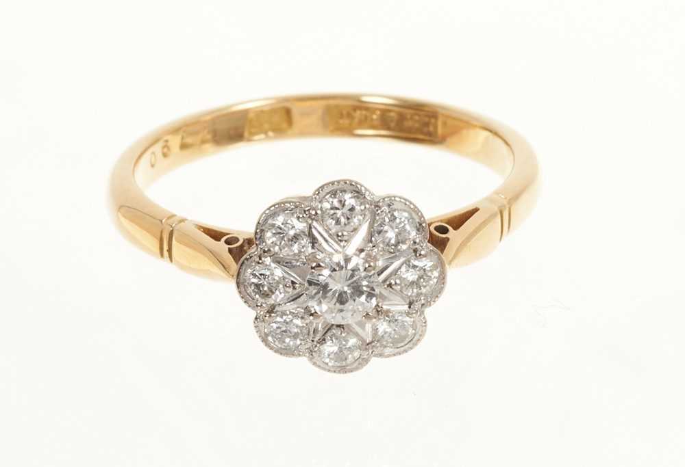 Lot 436 18ct gold diamond flower head cluster ring