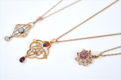 Lot 443 - Two Edwardian gold open work pendant necklaces and a gold ruby cluster pendant on chain