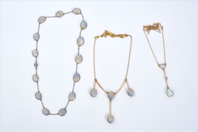 Lot 445 - Edwardian 9ct gold opal drop pendant necklace and two operculum shell necklaces