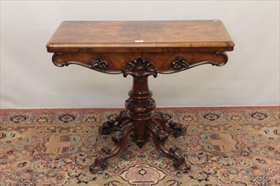 Lot 1291 - Late Regency figured walnut tea table