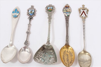 Lot 40 - Ten silver/white metal and enamel souvenir spoons