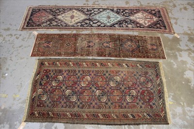 Lot 1424 - Afghan runner with two other rugs