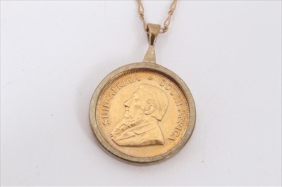 Lot 64 - Gold 1/10 Krugerrand, 1987, in 9ct gold pendant mount on 9ct gold chain