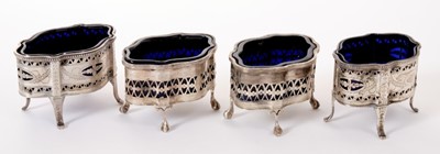 Lot 210 - Two pairs of silver Neo-Classical  silver salts with blue glass liners