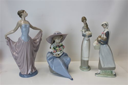 Lot 2053 - Four Lladro porcelain figures - including...