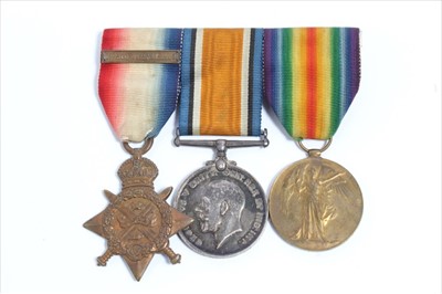 Lot 605 - First World War 1914 'Mons' Star trio comprising 1914 Star with 5th Aug. - 22nd Nov. Clasp, War and Victory medals named to L-7886 PTE. A.V. Clements. 1/The Queen's R. (Mounted on bar)