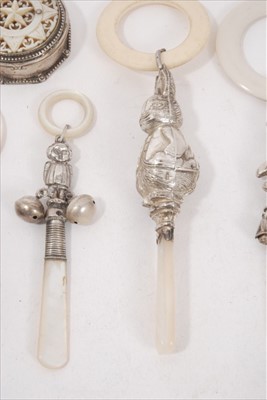 Lot 189 - Group of five novelty teething rattles, together with a silver mother of pearl lidded box