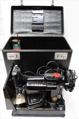 Lot 1870 - Vintage Singer portable electric sewing machine in case, model 221k