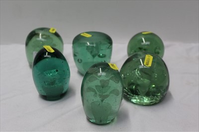 Lot 902 - Collection of six Victorian green glass paperweights to include Stourbridge and Castleford (6)