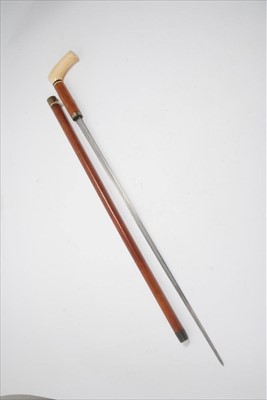 Lot 768 - Good quality 19th century sword stick with ivory handle, etched fullered taper blade in malacca sheath