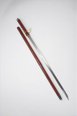 Lot 769 - Good quality 19th century Japanese sword stick with straight double fullered blade in red lacquered walking stick casing with white metal pommel, the blade 59cm