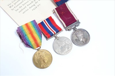 Lot 641 - First World War Victory medal named to 7402. PTE. E. C. Becker. S. Staff. R. together with a Second World War, war medal and a George VI Army Long Service and Good Conduct medal named to T-17736 S....