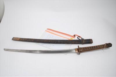 Lot 779 - Second World War Japanese Officers' Katana sword with earlier signed blade, regulation military mounts and unusual rattan covered scabbard. The blade 63cm (excluding tang )