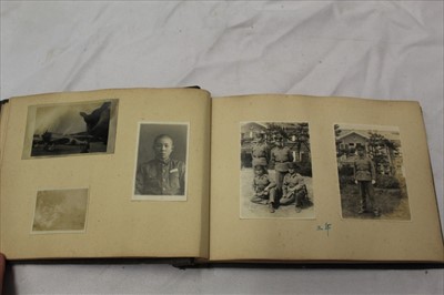 Lot 1080 - Photographs in album. 1940s Japanese military, officers, soldiers, training, parades, school children etc.