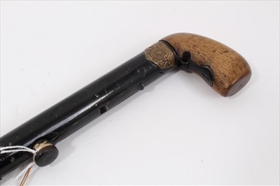 Lot 807 - 19th century Day's Patent 1823 percussion underhammer stick gun with walnut pistol handle, gilt brass Royal arms patent plaque and black enamelled steel barrel shaft with concealed trigger and but...