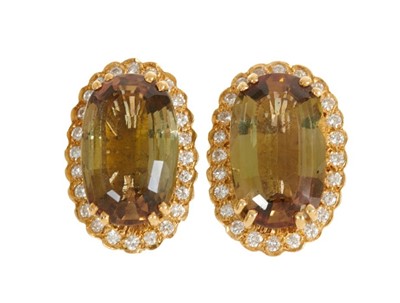 Lot 424 - Pair of andalusite and diamond cluster earrings