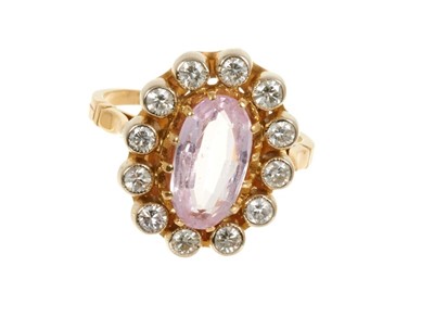 Lot 425 - Pink topaz and diamond cluster ring