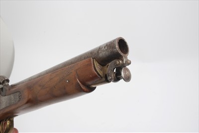 Lot 818 - 19th century Indian trade percussion military pistol with swivel ramrod and brass mounts, the barrel 24.5cm, the pistol 38cm