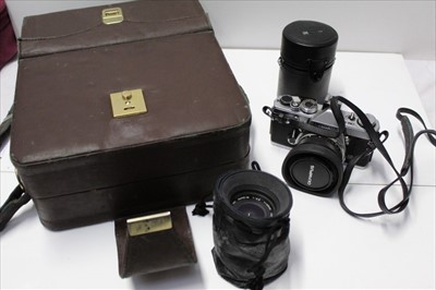 Lot 1810 - Olympus OM-1 Camera in case together with lenses