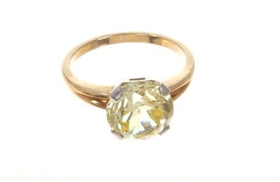 Lot 484 - Synthetic yellow sapphire single stone ring