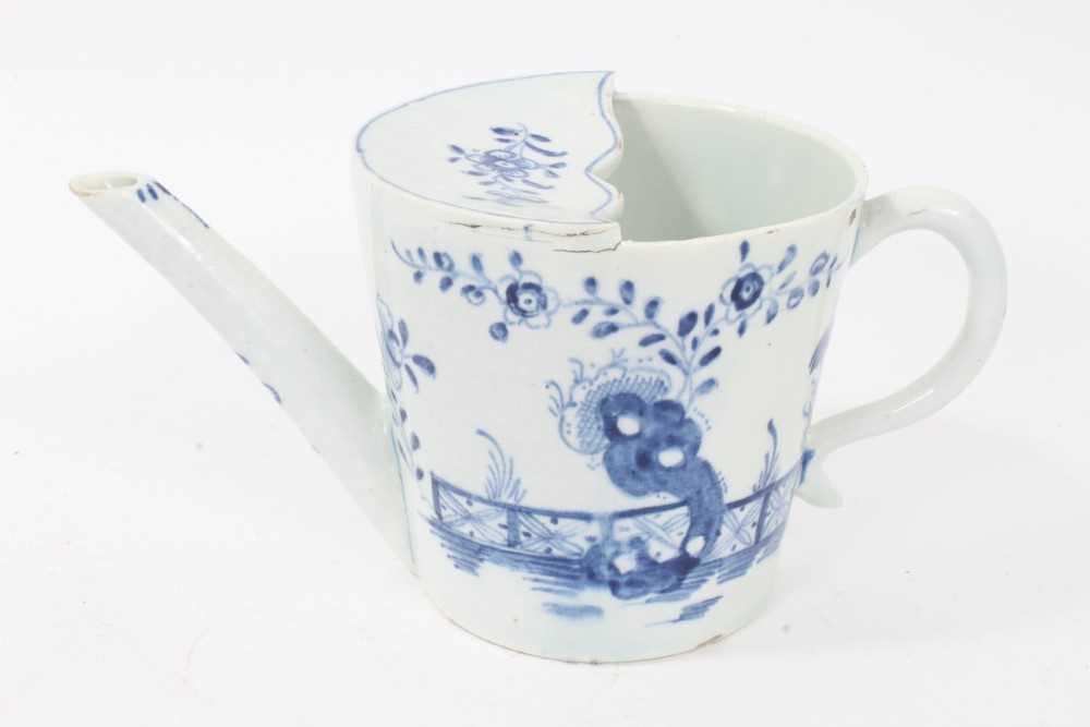 Lot 32 - Lowestoft feeding cup, cylindrical, painted with a blue rock and fence design, c.1770