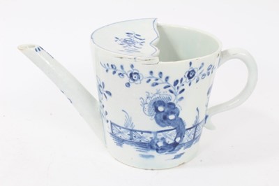 Lot 32 - Lowestoft feeding cup, cylindrical, painted with a blue rock and fence design, c.1770