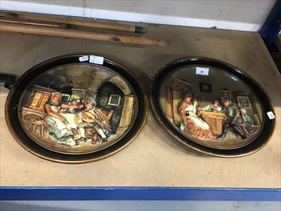 Lot 97 - Pair of pottery plaques