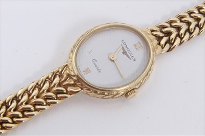 Lot 110 - Ladies 9ct gold Longines wristwatch in box with papers