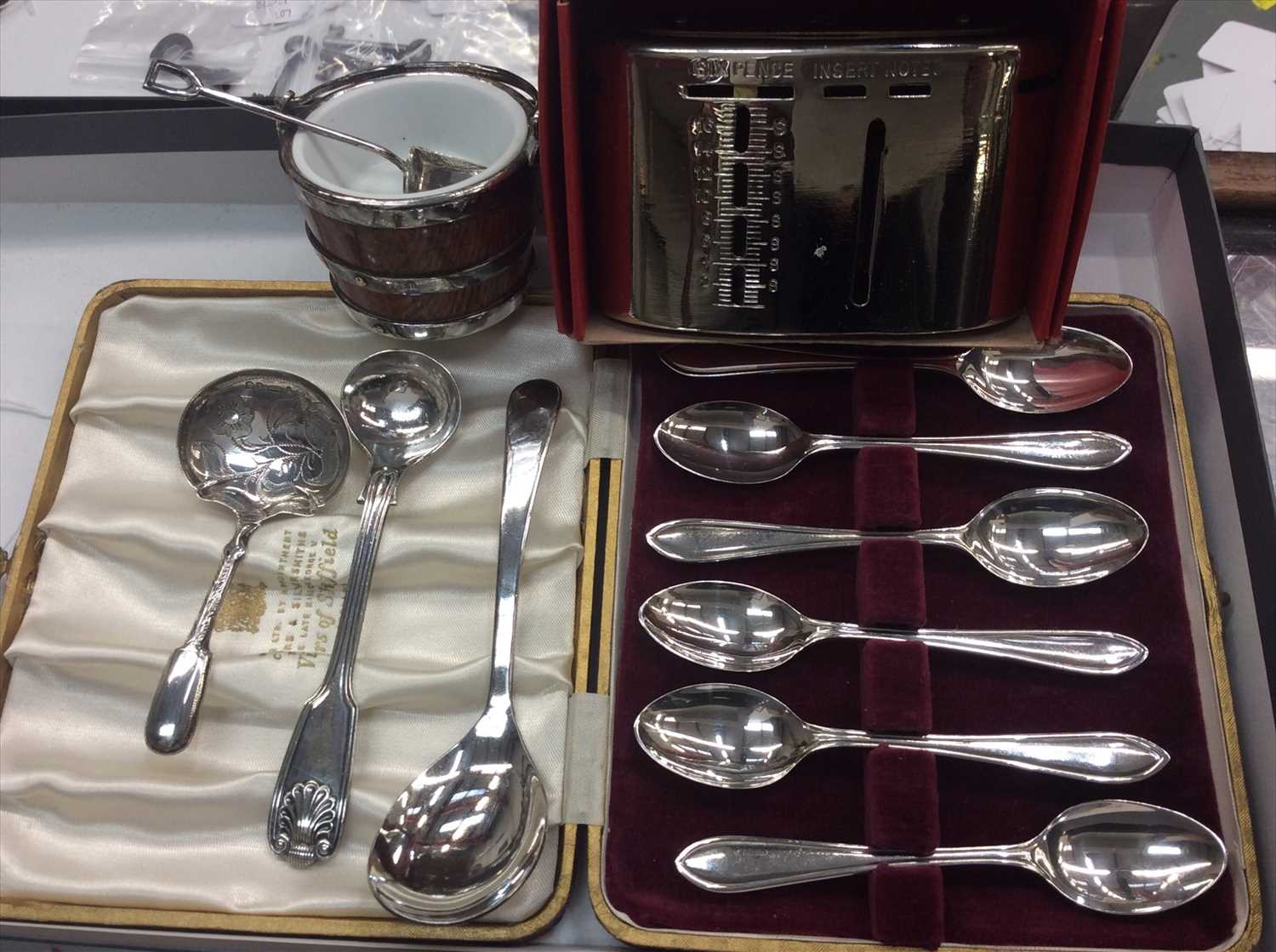 Lot 654 - Cased set of six silver teaspoons ,Victorian silver caddy spoon, together with an Edwardian salt and a money box