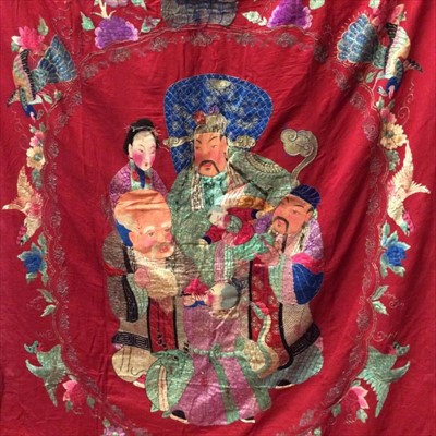 Lot 1646 - Chinese large embroidered red silk panel c19th century couch and satin stitch, large figures with painted faces. Scrolling border with exotic birds and flowers. Unlined.