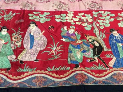 Lot 1649 - Chinese long embroidered red silk panel c19th century couch and satin stitch figures in garden scene with pagoda and horses etc. Lined with Chinese floral printed cotton with fring...