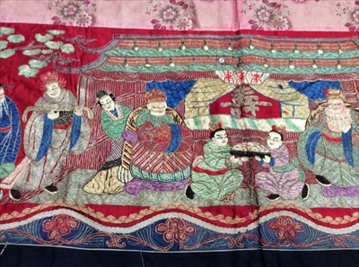 Lot 1649 - Chinese long embroidered red silk panel c19th century couch and satin stitch figures in garden scene with pagoda and horses etc. Lined with Chinese floral printed cotton with fring...