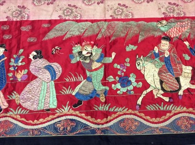 Lot 1649 - Chinese long embroidered red silk panel c19th century couch and satin stitch figures in garden scene with pagoda and horses etc. Lined with Chinese floral printed cotton with fring...