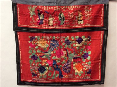 Lot 1652 - Chinese embroidered red silk alter panel c19th century couch and satin stitch, figures with painted faces, exotic birds and flowers. . Lined in blue cotton.