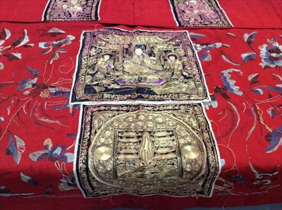 Lot 1659 - Chinese large 19th century red wool panel with silk thread embroidery with appliquéd embroidered black silk panels