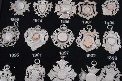 Lot 91 - Collection of twenty five Victorian and later silver fobs
