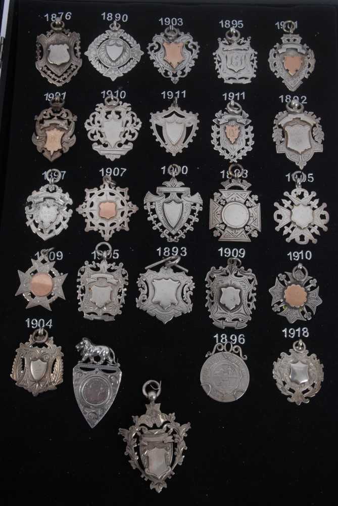 Lot 94 - Collection of twenty five Victorian and later silver fobs