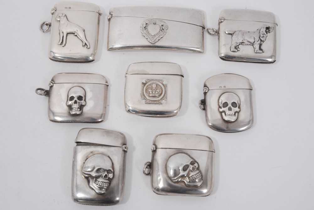 Lot 95 - Collection of eight Victorian and later silver Vesta cases including three with applied skull decoration