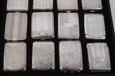 Lot 102 - Collection of twenty early 20th century silver match book holders