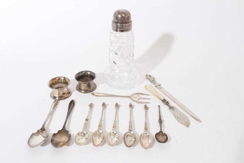 Lot 222 - Selection of silver and white metal, including paper knife, napkin rings, silver lidded sifter.