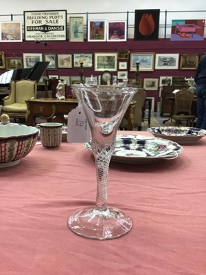 Lot 14 - 18th century wine glass with multi-spiral airtwist stem, together with an 18th century opaque twist glass with ogee bowl (2)