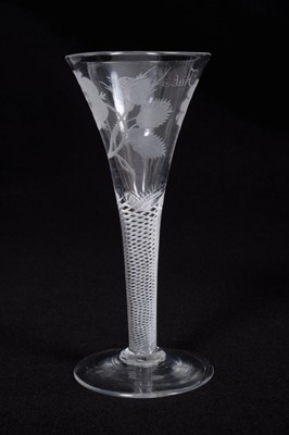 Lot 6 - Jacobite wine glass, the trumpet bowl engraved with rose and buds, and the motto 'Fiat', on a multi-spiral air twist stem, above a conical foot, circa 1750, 16.75cm height