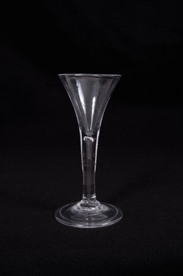 Lot 11 - Georgian wine glass, the trumpet bowl on a plain stem with teardrop inclusion, above a conical foot, circa 1750, 14.5cm height