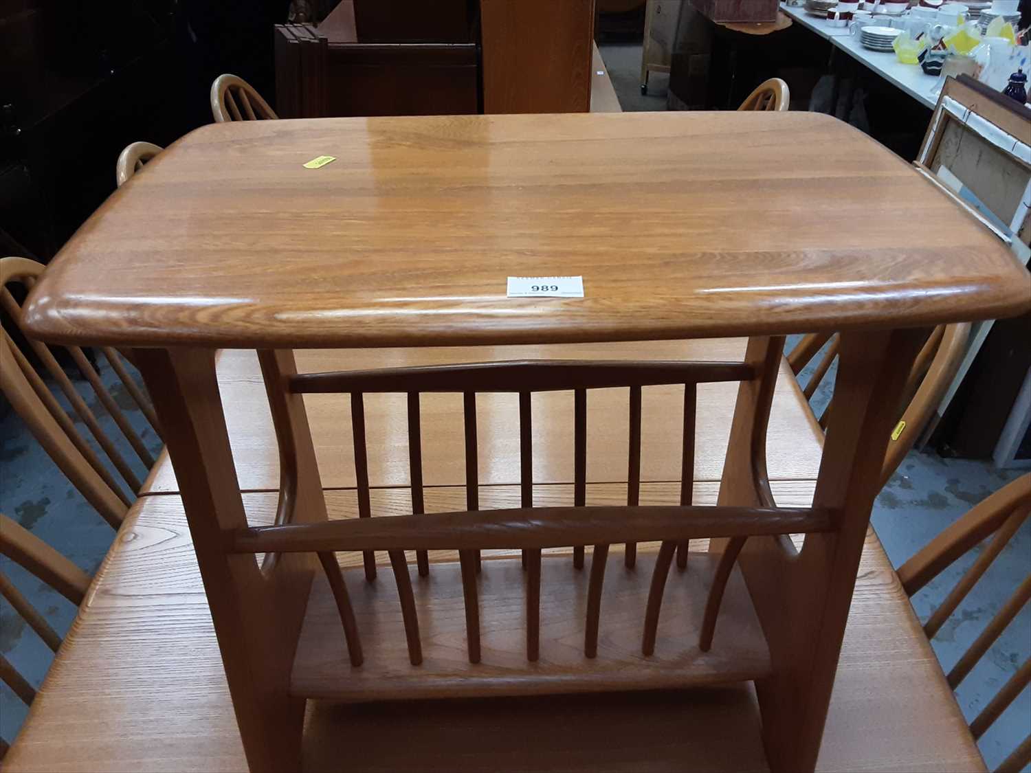 Lot 989 - Ercol magazine rack