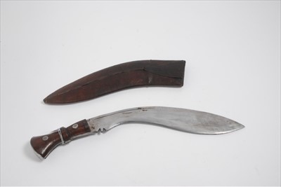 Lot 786 - First World War British Military issue Kukri with broad arrow mark, dated 1916 In leather sheath