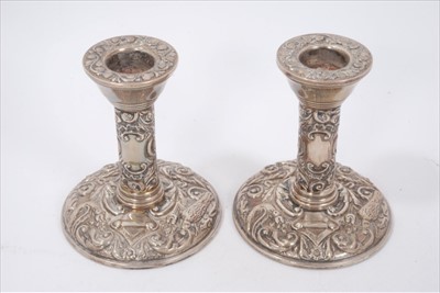 Lot 178 - Pair silver candlesticks, silver topped glass jar and atomiser, all with bird and scroll decoration