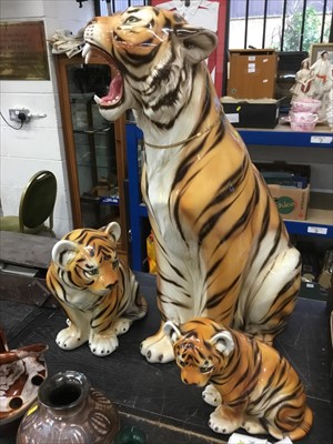 Lot 144 - Family of three large ceramic tigers