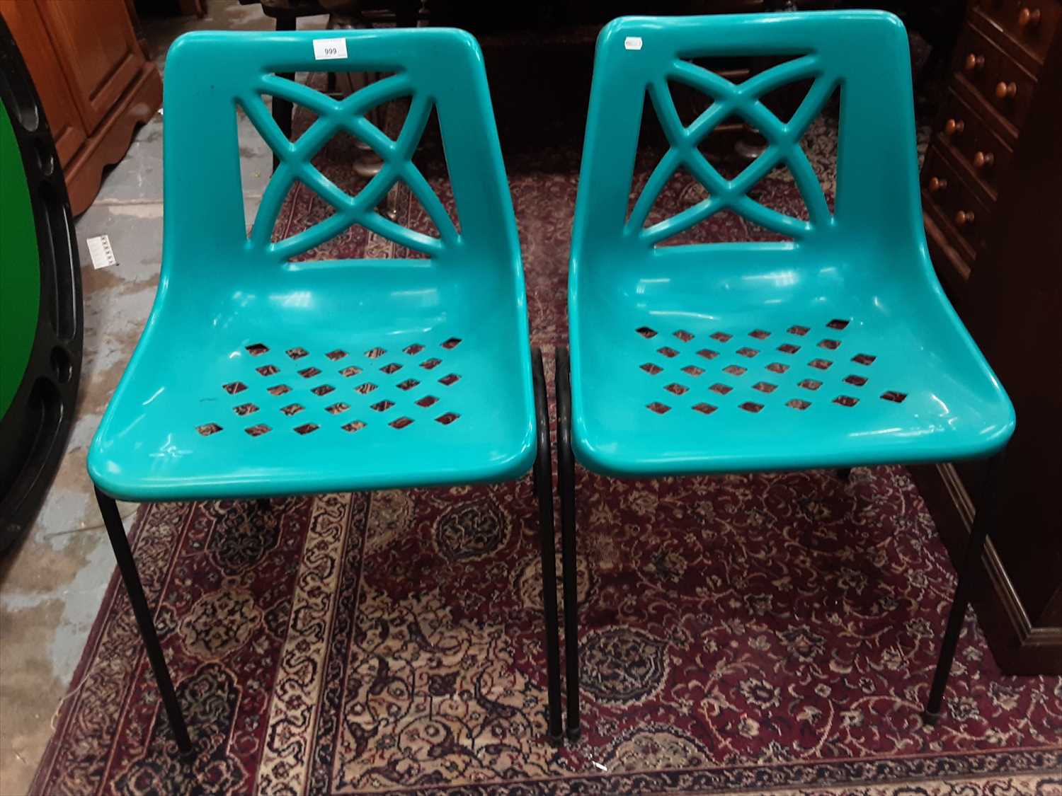 Lot 999 - Set of six 1970s Geeco turquoise plastic stacking chairs with tubular steel legs